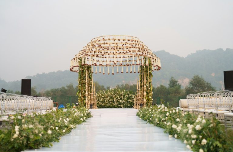 Floral aisle leading to the mandap