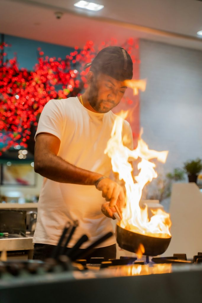 Chef cooking at a live counter