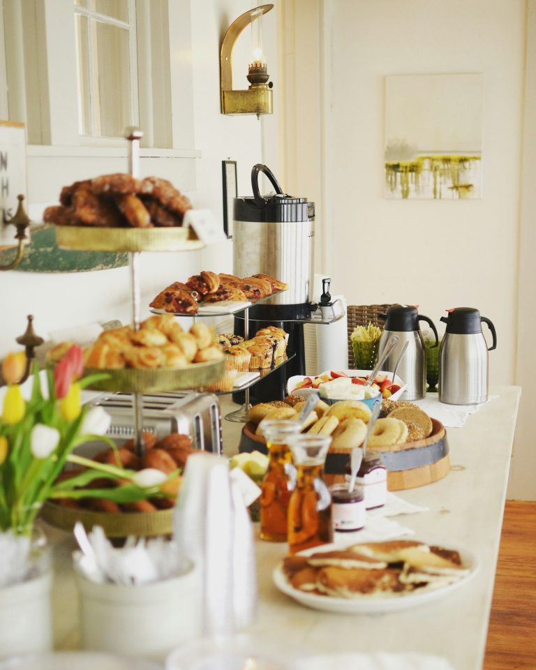 Buffet spread with desserts and drinks
