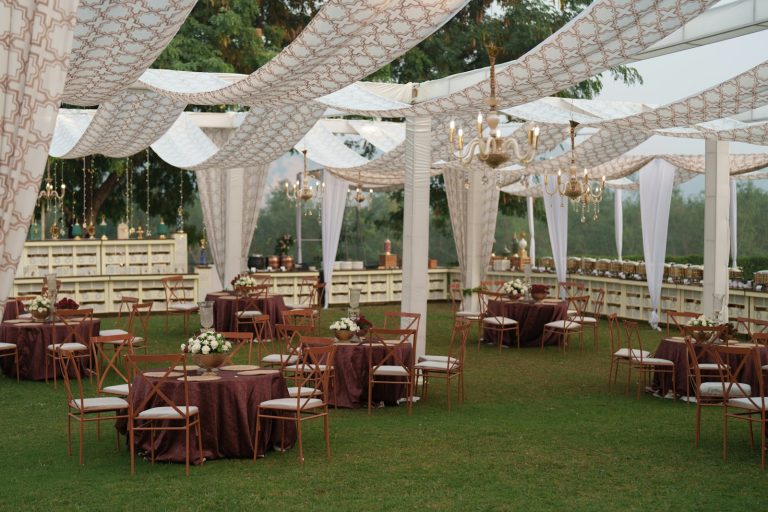 Draped entrance and dining area for a celebration