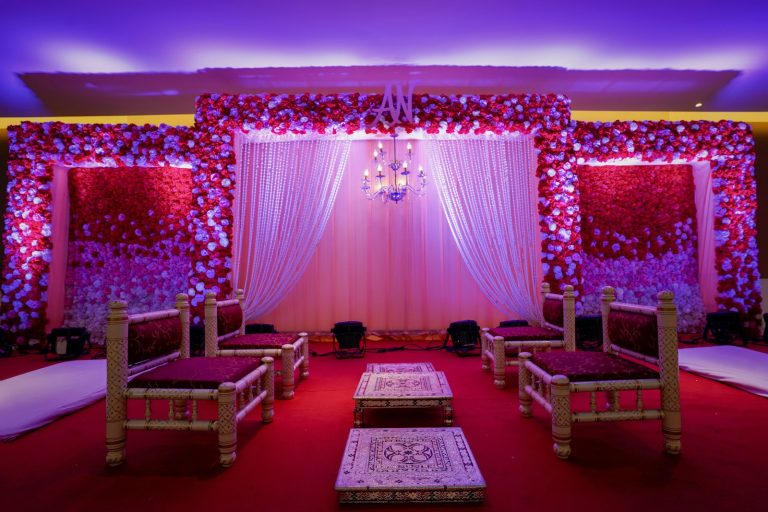 Purple-lit wedding stage