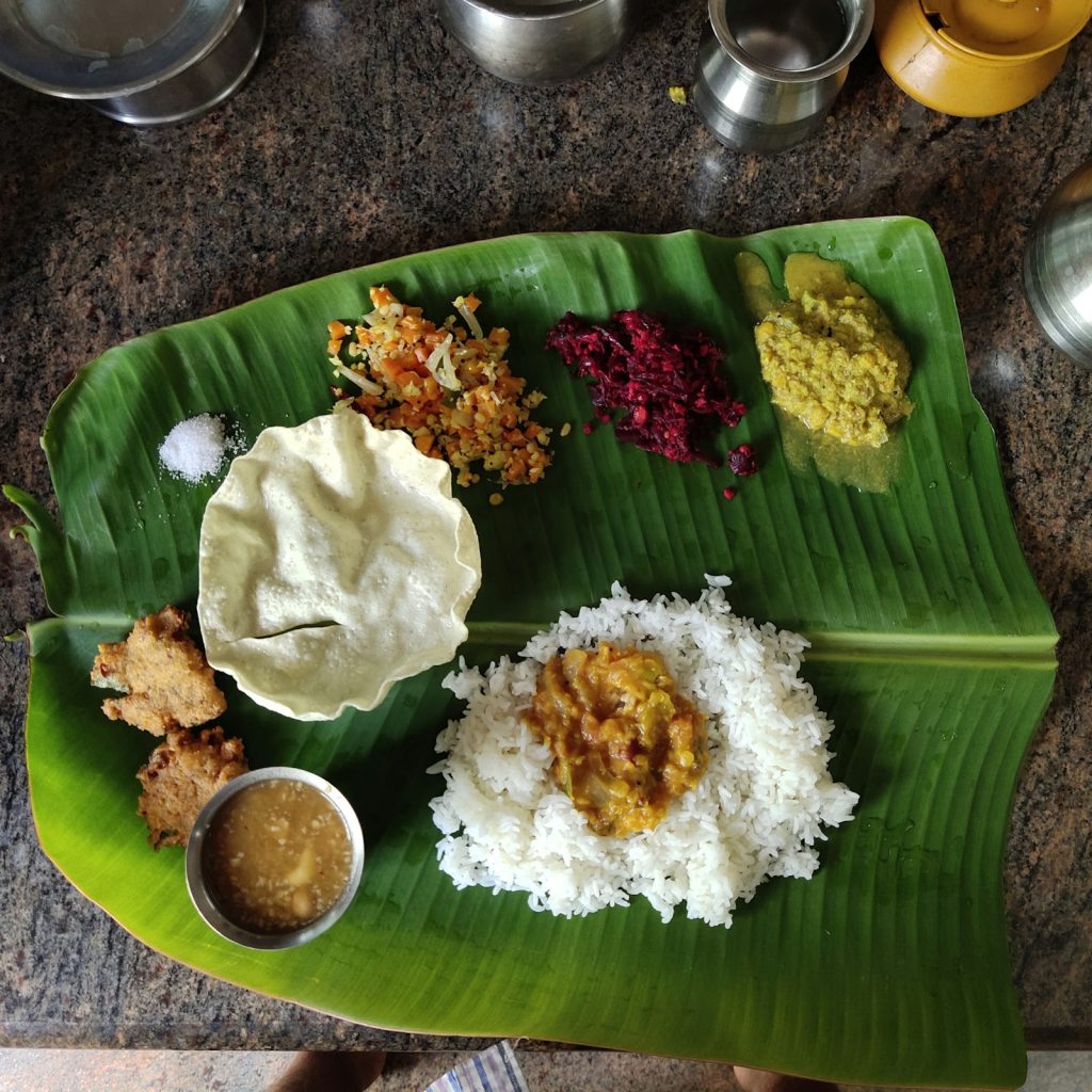 Traditional Kerala sadhya on a banana leaf